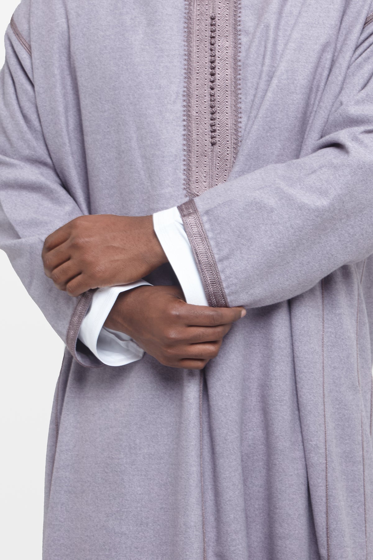 Detail of the embroidered cuff and sleeve on a hooded Moroccan thobe